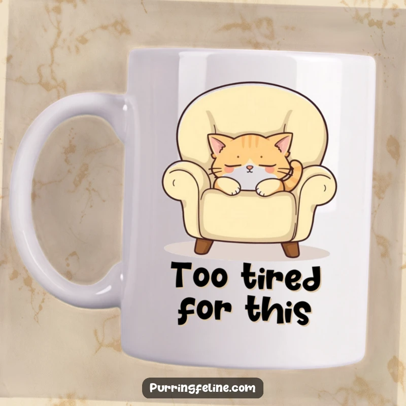 Funny mug showing a sleepy cat dozing off in a plush armchair, conveying ultimate relaxation and cozy comfort.